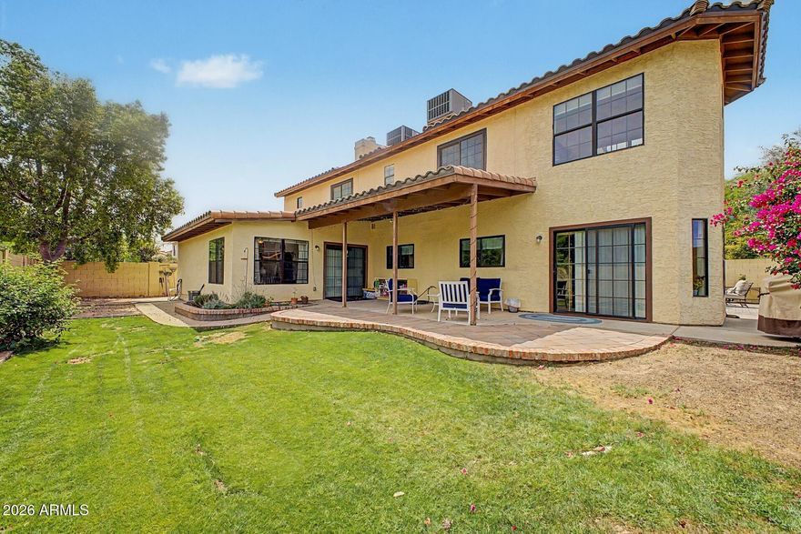 ONLY $220 PER SQUARE FT FOR A 5 BEDROOM HOME IN TEMPE!!! Stunningly UPDATED 5-Bedroom/3.5 Bath in highly desirable 'Estate la Colina' offers lots of personal space for a large or multi-generational family!  NEW extra-large plate-glass front Window! Kitchens and Bathrooms professionally remodeled. NEW Flooring & fresh Paint thru-out. NEW Fans & Lighting. NEW Pavers. Classy NEW Front Door. NEW Garage Door. NEW water heater. Two Master Bedrooms ~ one downstairs, one upstairs. Upstairs Master boasts NEW Custom Closet System, Balcony to enjoy sunsets!  Separate entrance for downstairs Master Bedroom.  NEW Gourmet Kitchen with NEW bonus coffee Bar, access to Courtyard Patio with garden area! Bonus/Reading Room upstairs with tons of natural light! Great neighborhood! NO HOA! Close to EVERYTHING! Backs to walking/bridle path (so no neighbor behind).   Not on a thru-street, so no unnecessary neighborhood traffic.  All 3 HVAC systems annually serviced.  Monthly Pest elimination.  Two water heaters.  Water Softener & R/O Systems.  Updated front landscaping.  TONS of bonus Storage Rooms - who needs a basement!  Dual-pane windows, Solar Screens...  this is a very unique home ~ not your typical cookie-cutter!