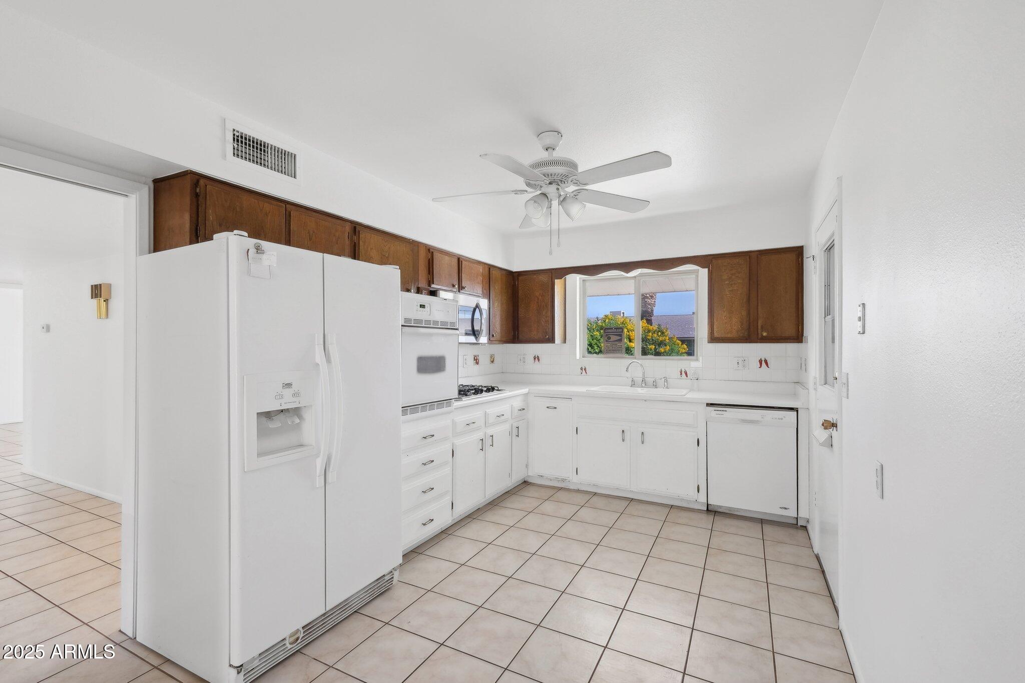 11044 W CHERYL Drive