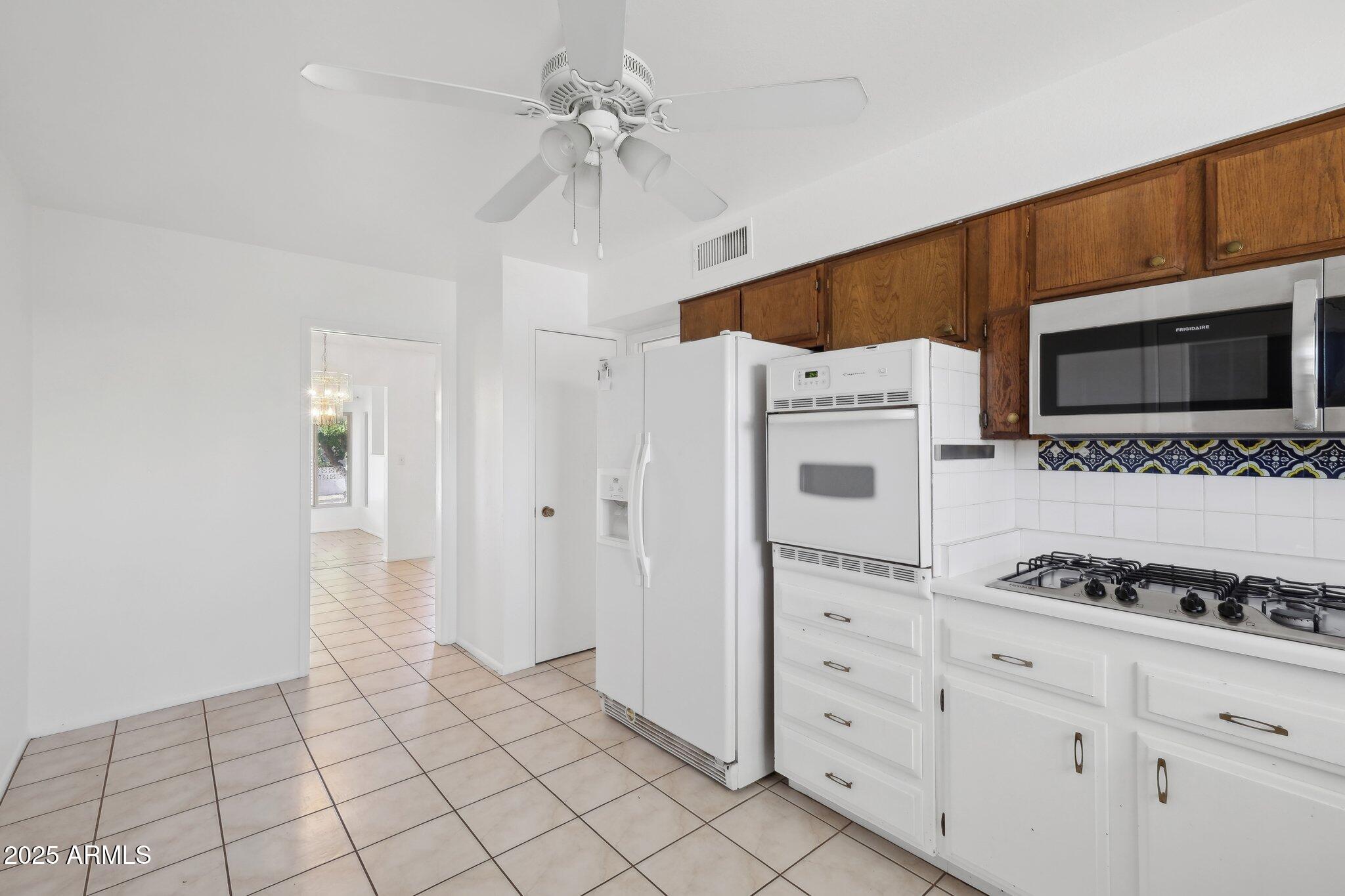 11044 W CHERYL Drive