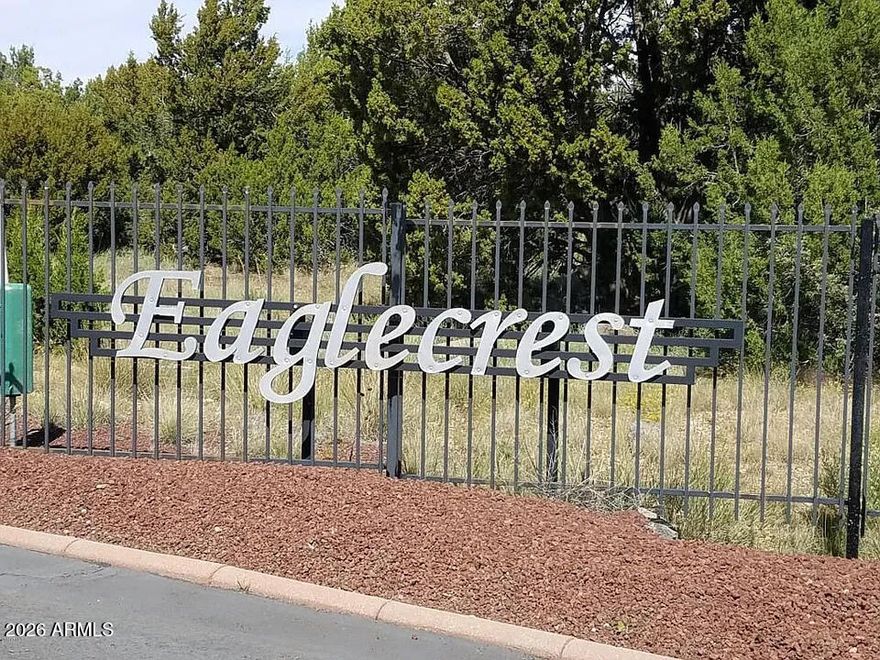 Check out this half-acre lot which is ready for you to build the home of your dream and the lot is  located around the 5th hole of Silver Creek Golf Club. This lot gives you access to White Mountain Lake, which is a lake for residents of this gated community, offering year-round recreation including swimming, boating, fishing, and wakeboarding. Utilities including water, sewer, electric, and cable are available, and the community features paved roads for easy access. This is a great location to live and play for the whole family. Seller Financing available.