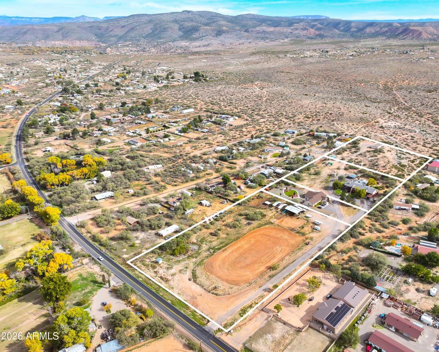 Rare chance to acquire a 10 acre multi parcel estate in the heart of Page Springs. This unique offering includes a large lodge style residence, a newer 2020 built home (currently being leased), a fully improved 4 acre equestrian parcel with an arena, barn, and approximately 345 feet of Page Springs Rd. frontage, and an additional 3 acre parcel backing state owned land with currently leased manufactured home. 

This parcel offers incredible flexibility for a variety of uses including a private estate, retreat center, multigenerational living, or investment opportunity. With a mix of residential, agricultural, and lifestyle features, the possibilities are endless. Home built in 2020 boasts 7 bedrooms, a den, and 6.5 bathrooms while the Main house has 10 bedrooms and 8.5 bathrooms, 3 bonus rooms, a formal dining room, upstairs and downstairs laundry, plus so many more amenities. The beauty, privacy, and setting of this property are something that truly must be experienced in person! 

Manufactured home has 3 bedrooms and 2 bathrooms. 

Enjoy the sweeping views of the Red Rocks and Mingus Mountain, privacy, and proximity to Sedona, Cottonwood, and the Verde Valley Wine Region. Properties with this of versatility and scale are extremely rare. 

Listing includes four parcels: 407-03-031D, 407-03-031F, 407-03-031E, 407-03-031A.