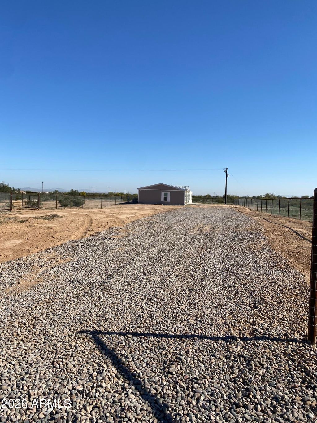 Photo of 519 S Ortega Road, Maricopa, AZ 85138 (MLS # 6974840)