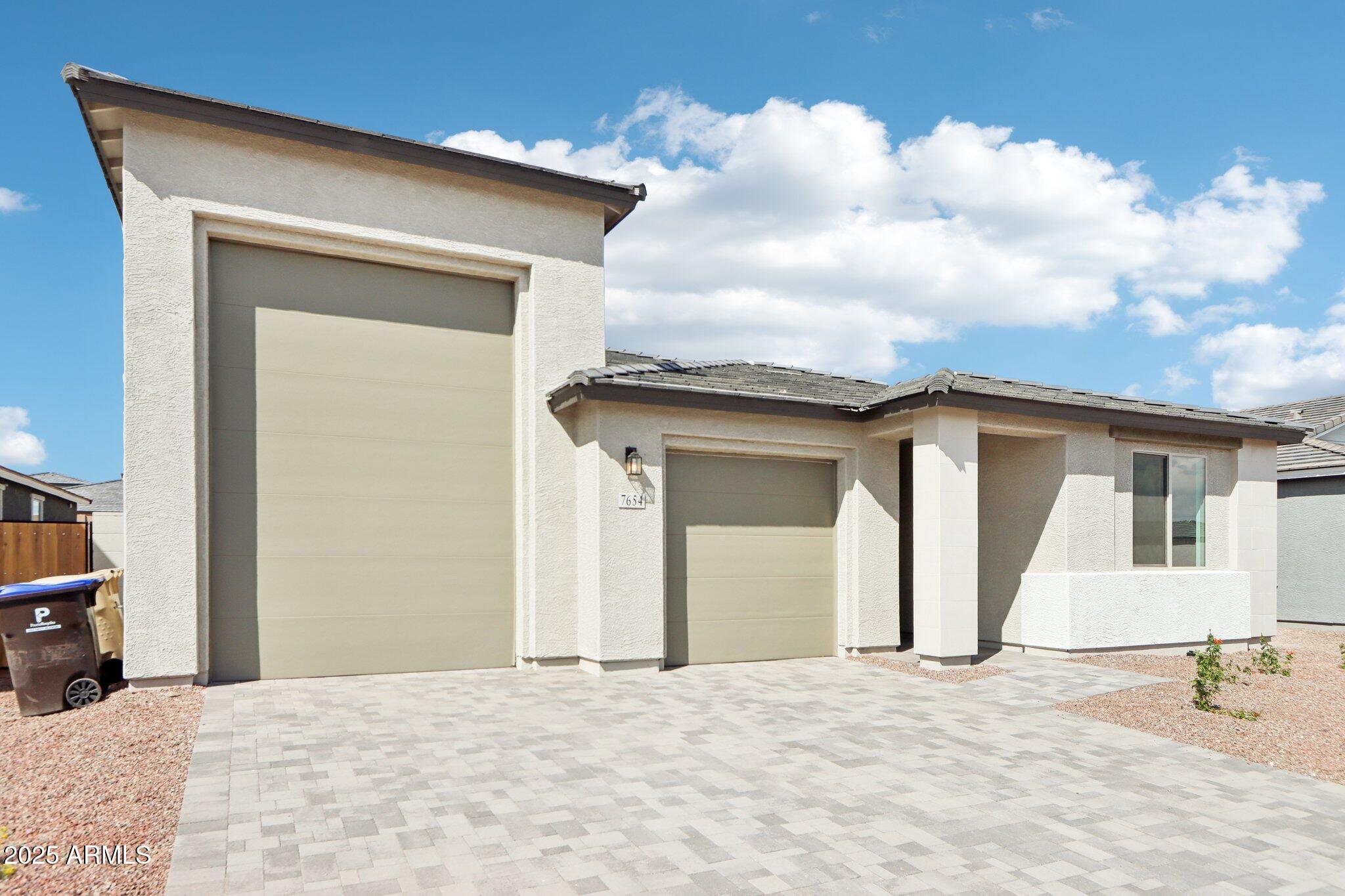 7654 W TETHER Trail