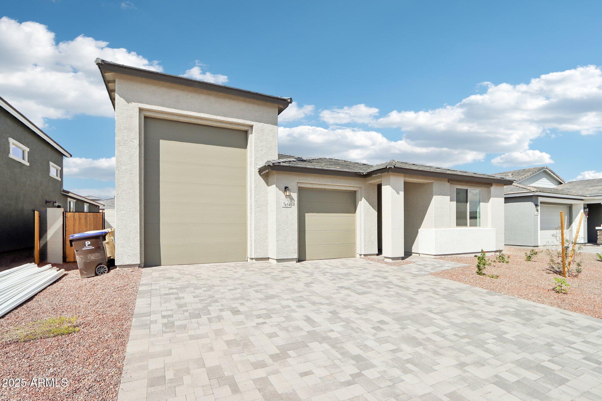7654 W TETHER Trail