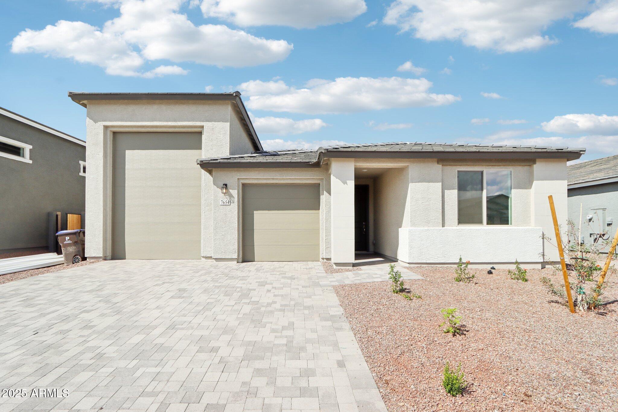 7654 W TETHER Trail