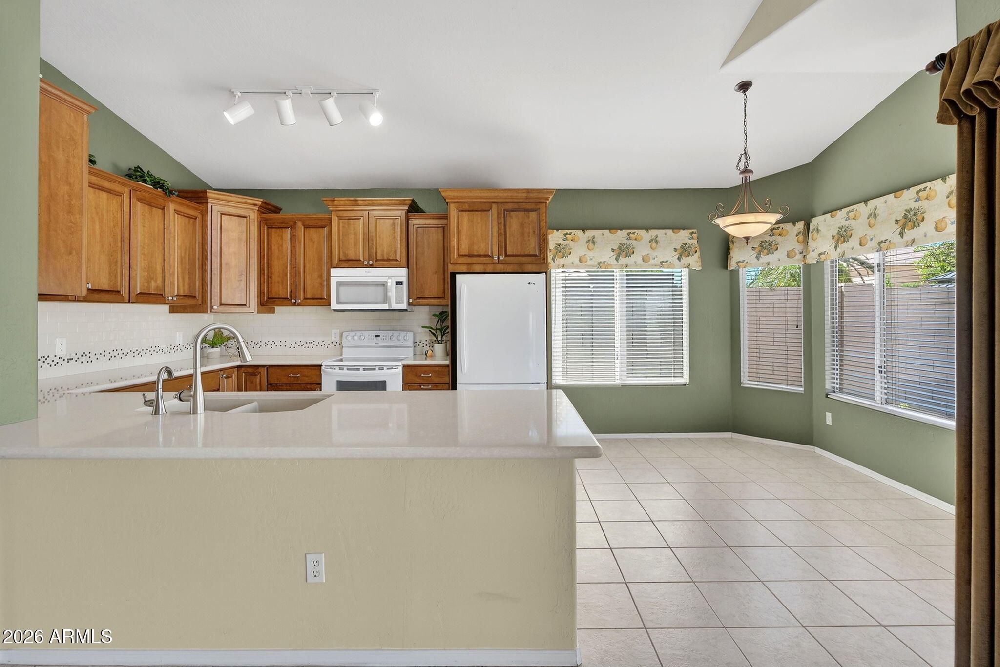 6208 E RIVERDALE Street