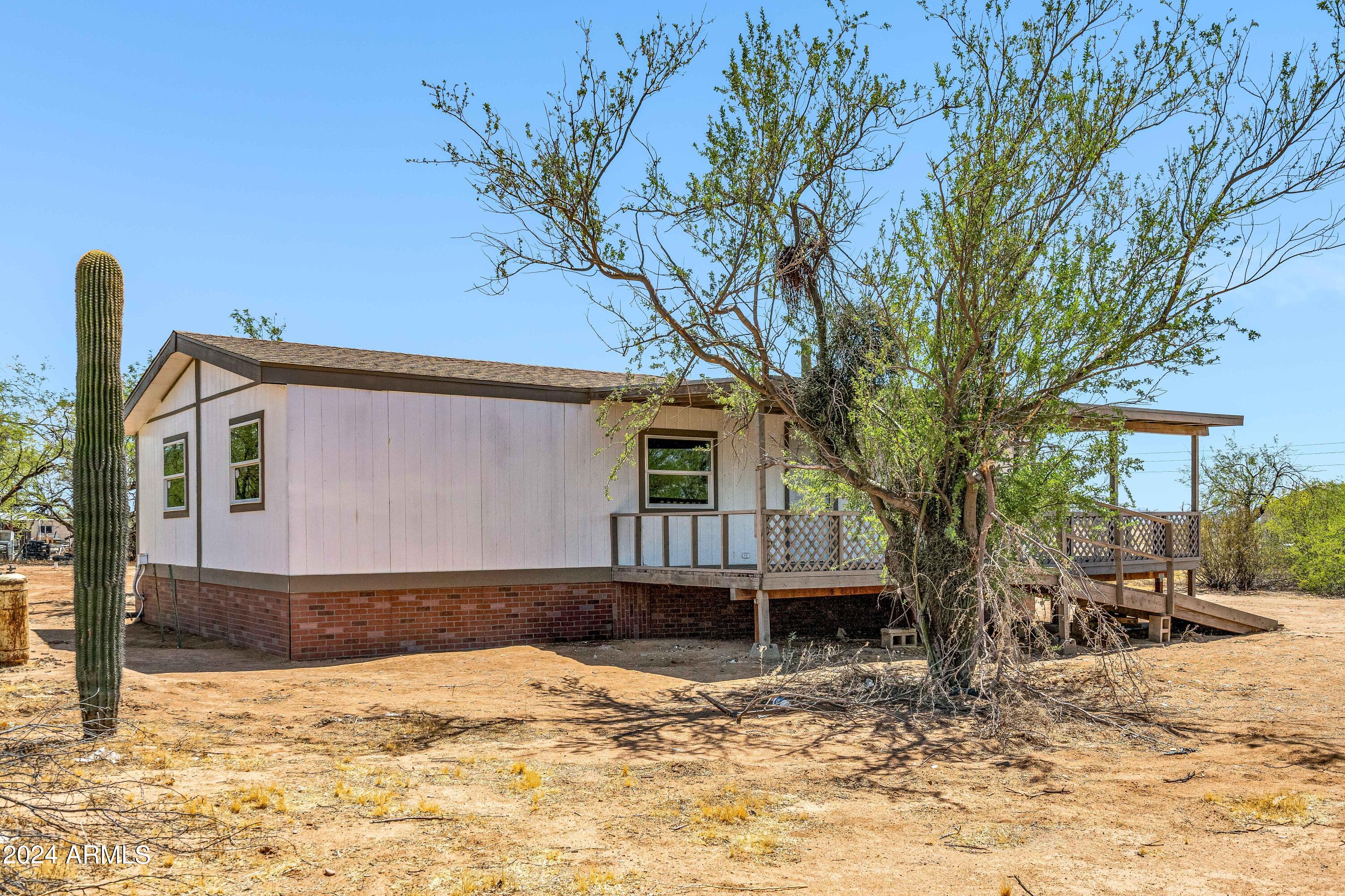 Photo 2 of 21 of 13475 W MUSTANG Road mobile home