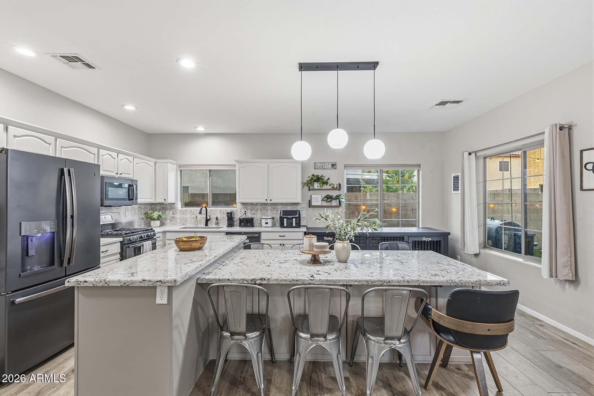 15938 W PORT ROYALE Lane