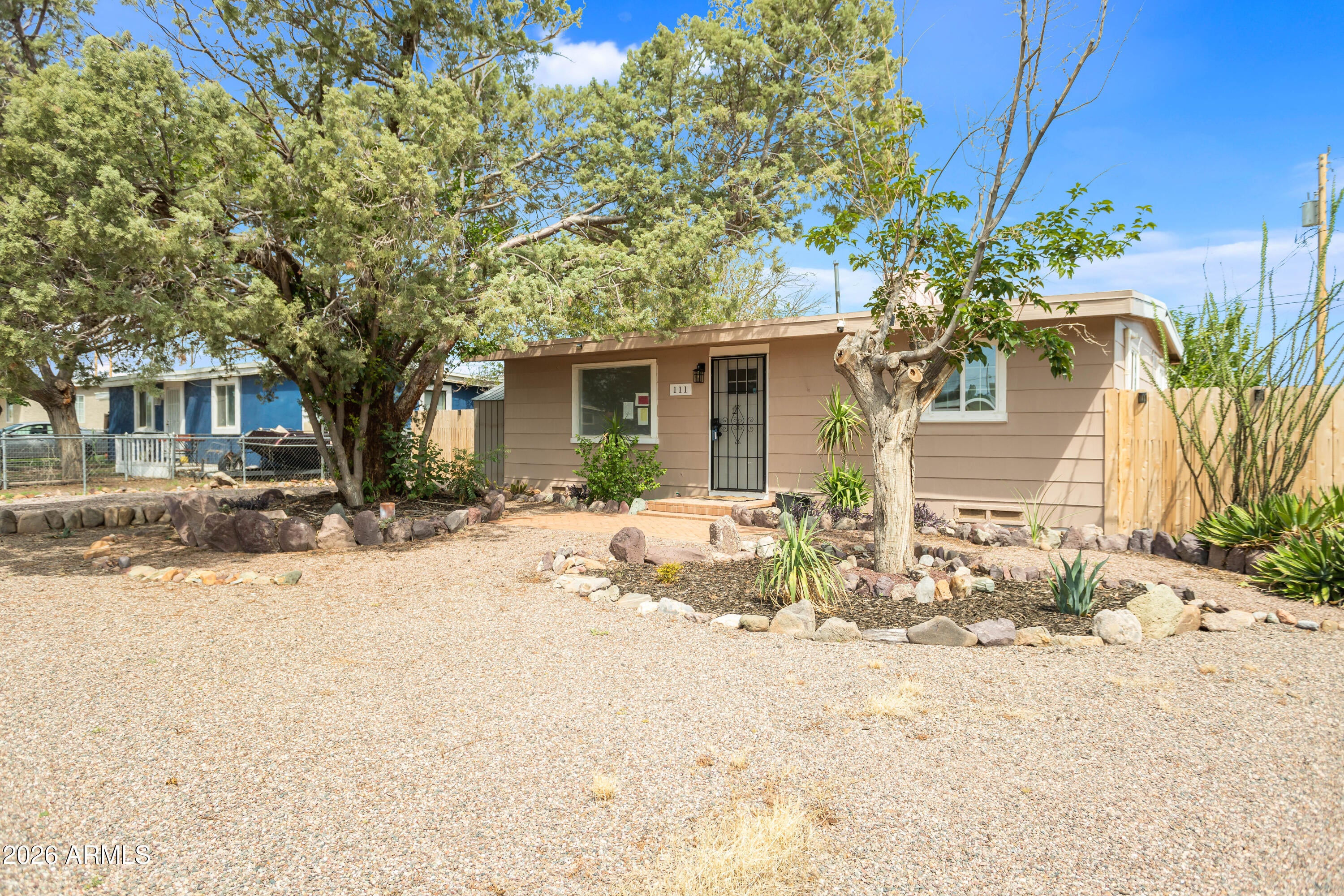111 E APACHE Street