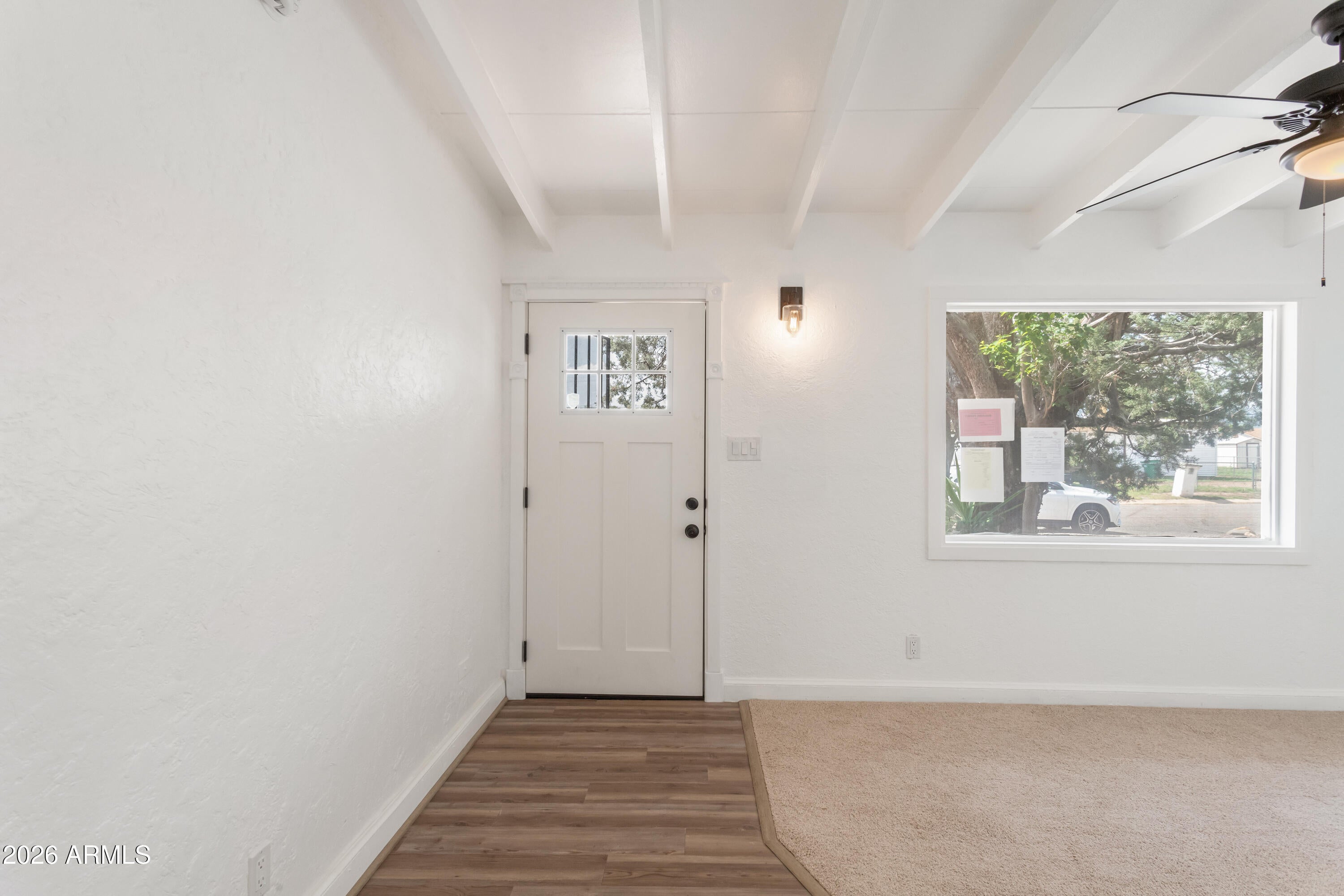 111 E APACHE Street