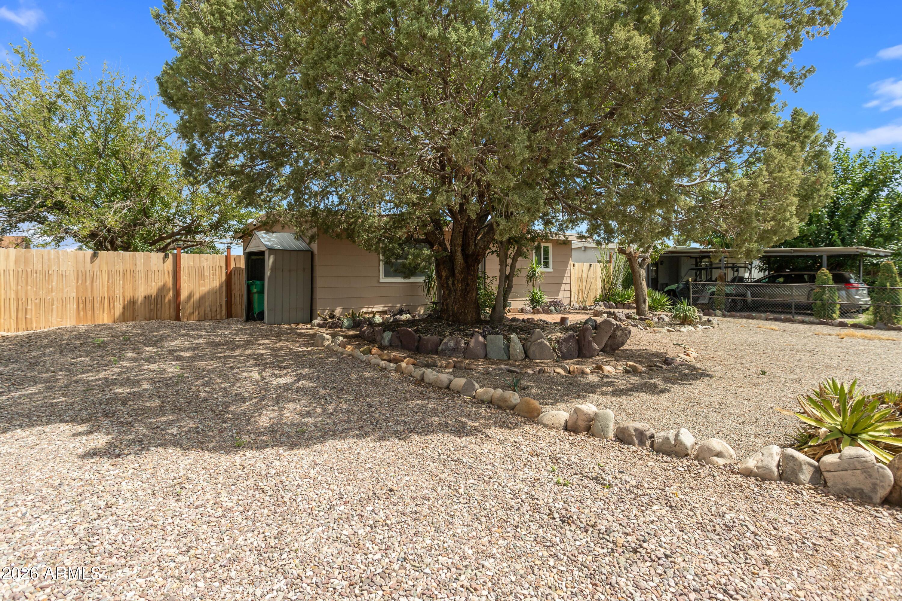 111 E APACHE Street