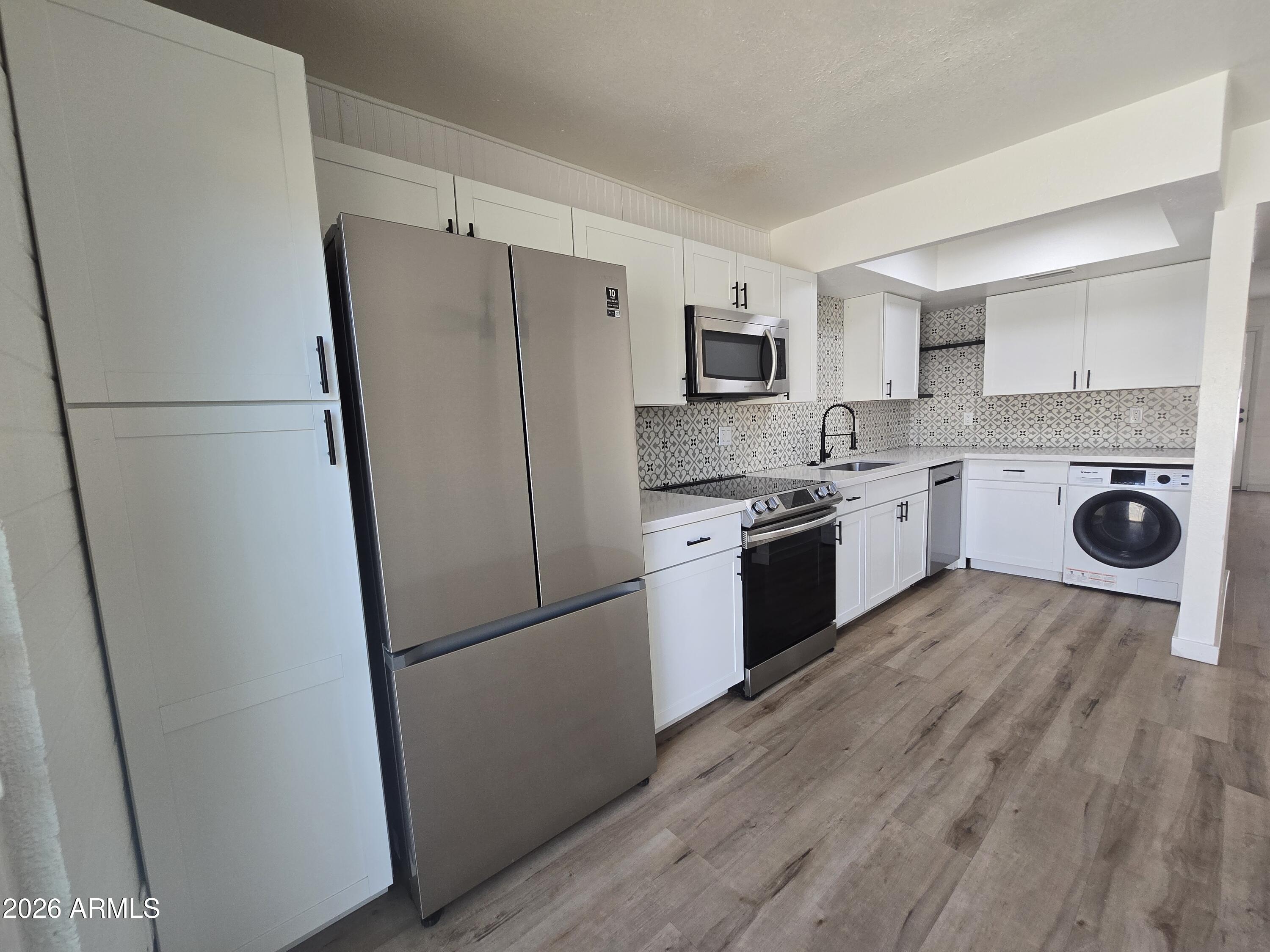4848 N WOODMERE FAIRWAY -- 16