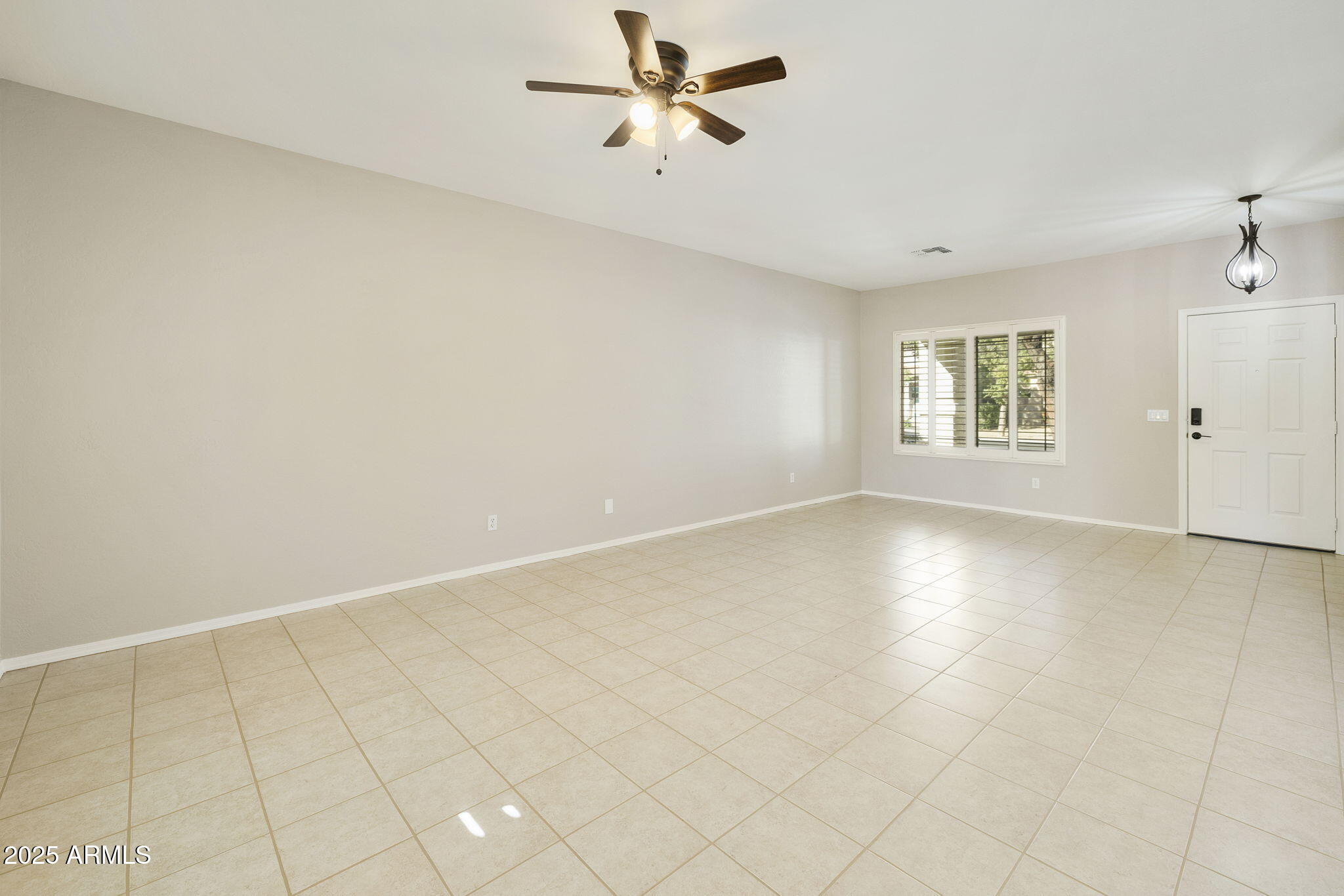 14213 W GELDING Drive