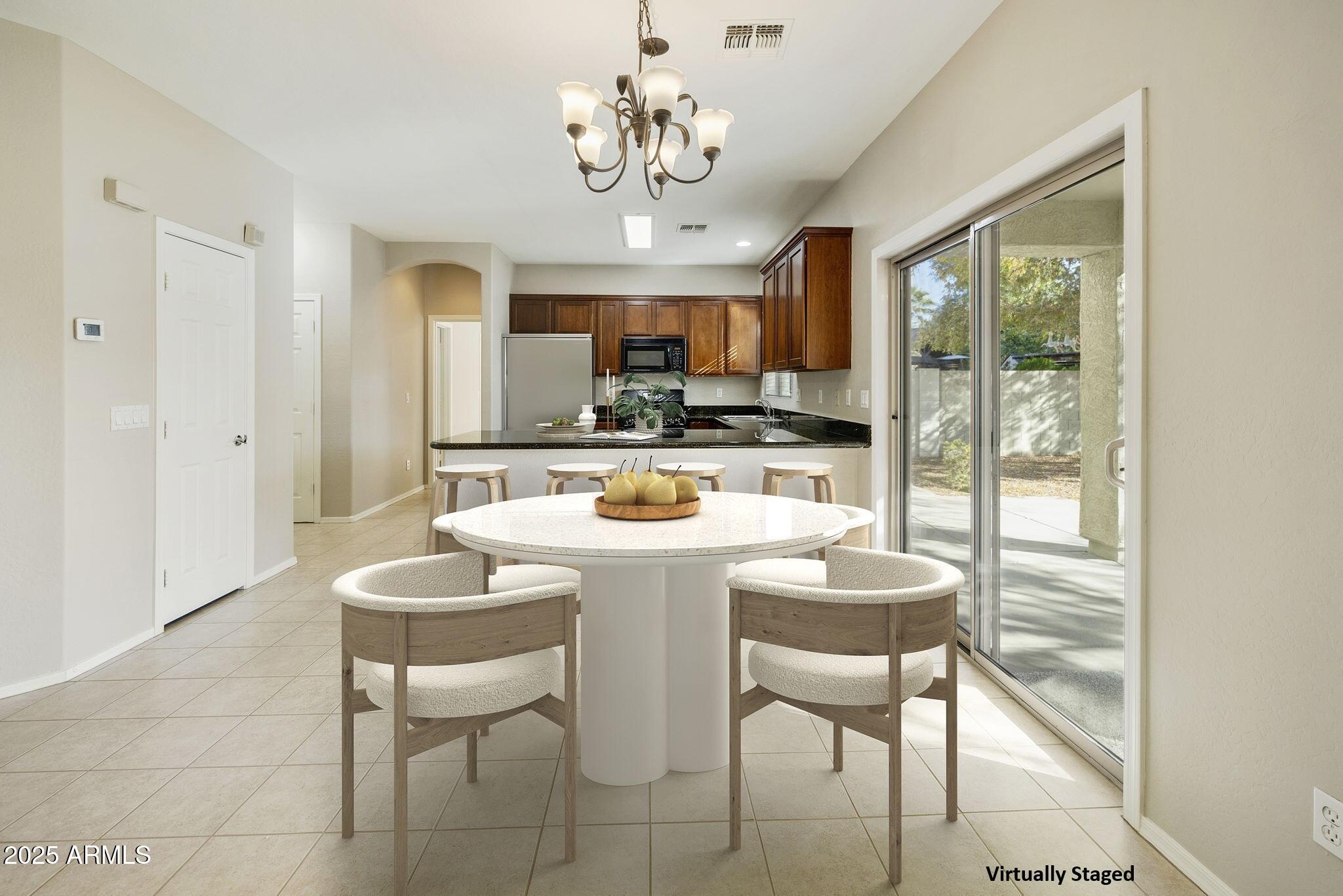 14213 W GELDING Drive