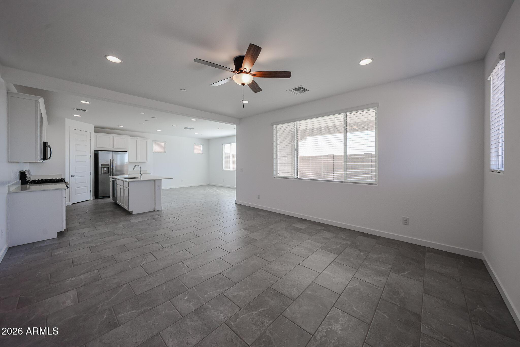 12073 W Calle De Pompas