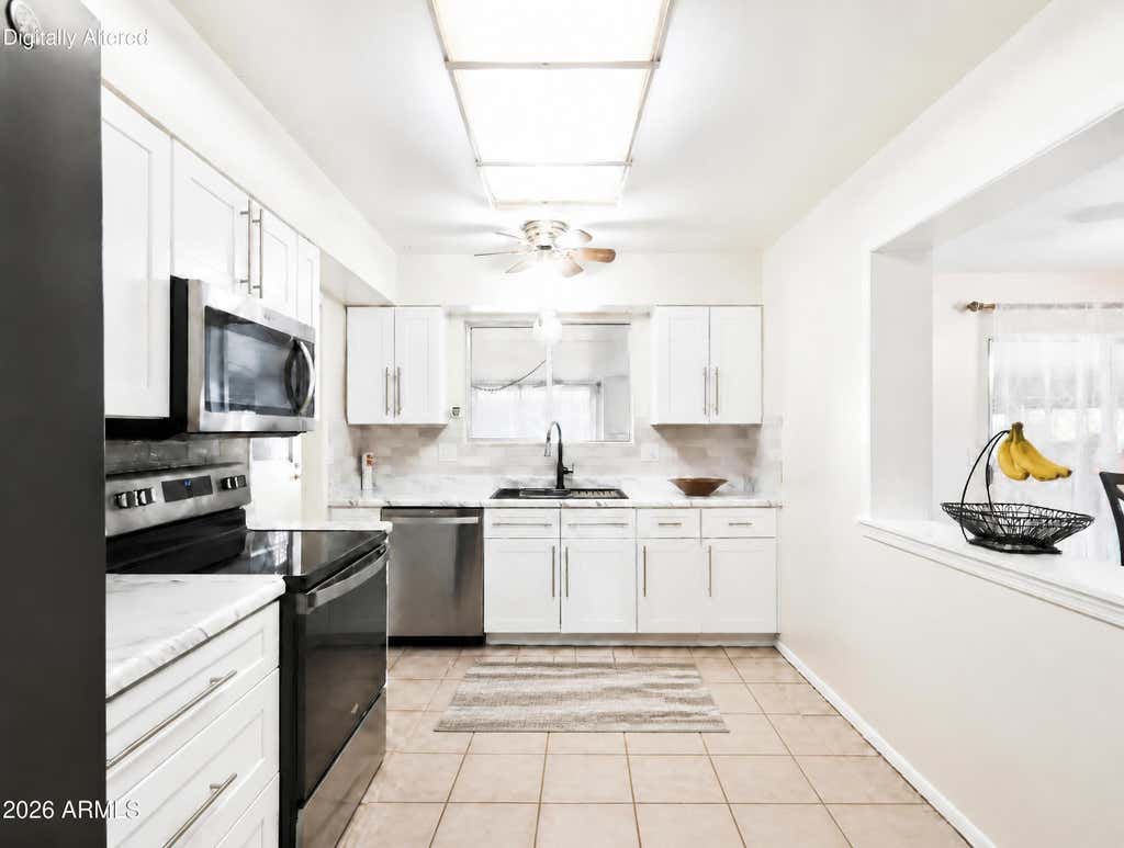 Photo of 10919 W Connecticut Avenue, Sun City, AZ 85351 (MLS # 7070538)