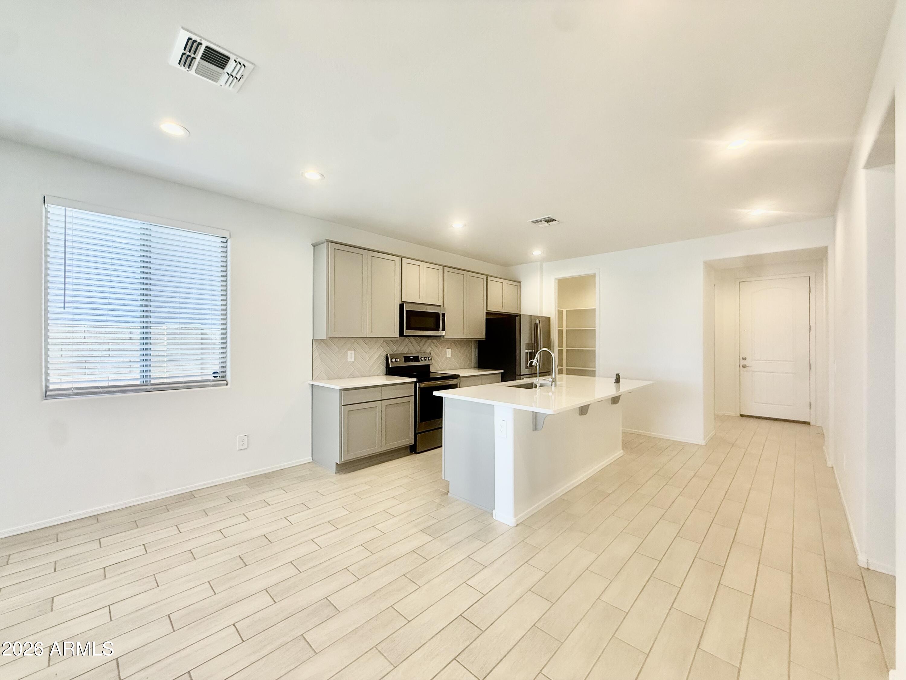 15689 W Woodlands Avenue