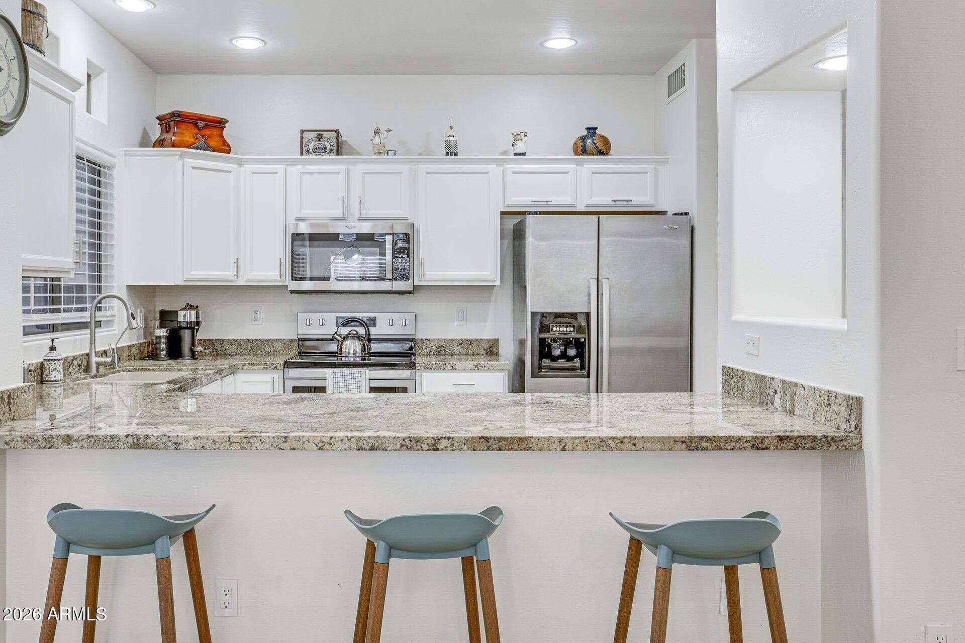 9100 E RAINTREE Drive 130