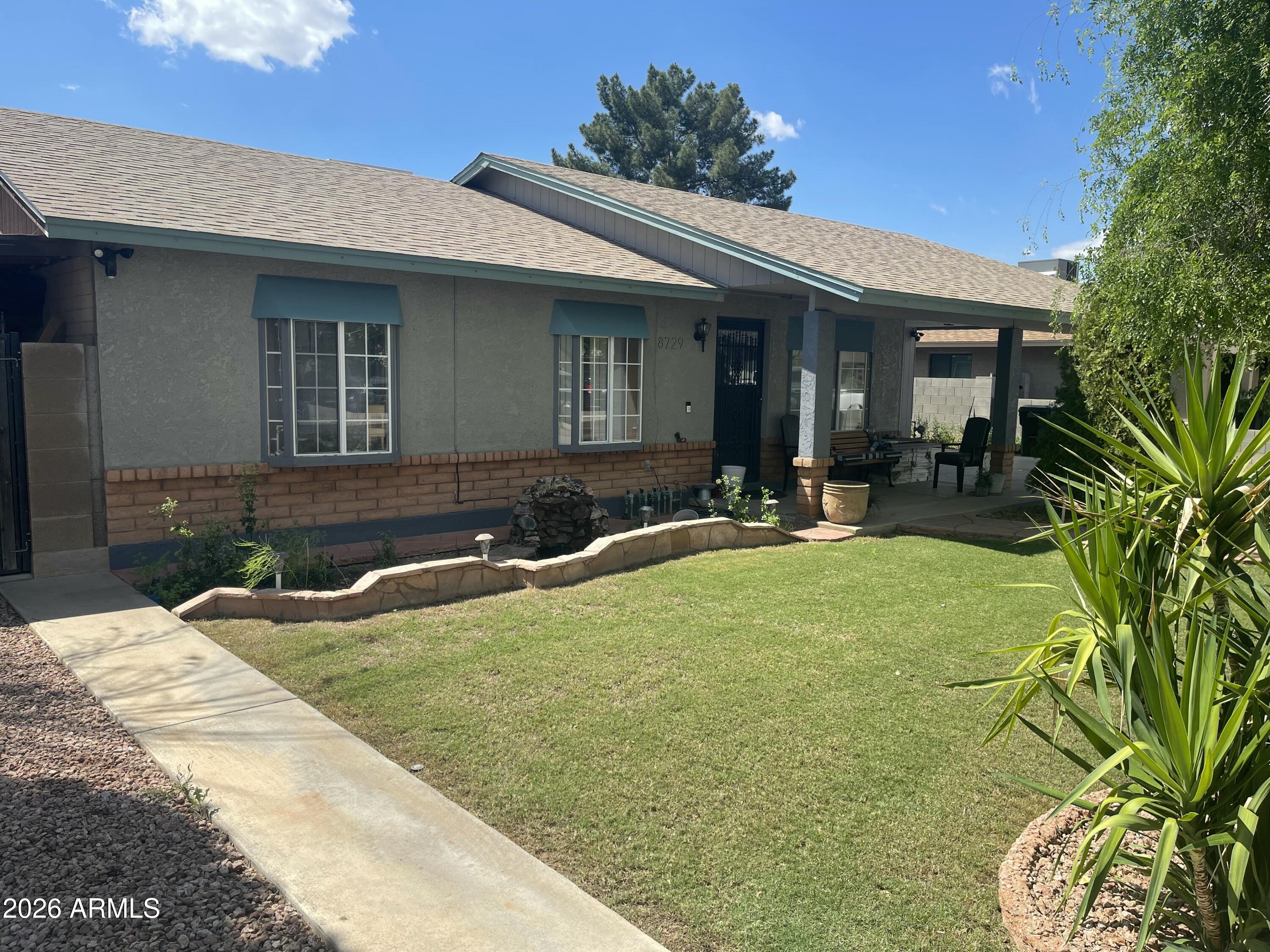 8729 W HIGHLAND Avenue