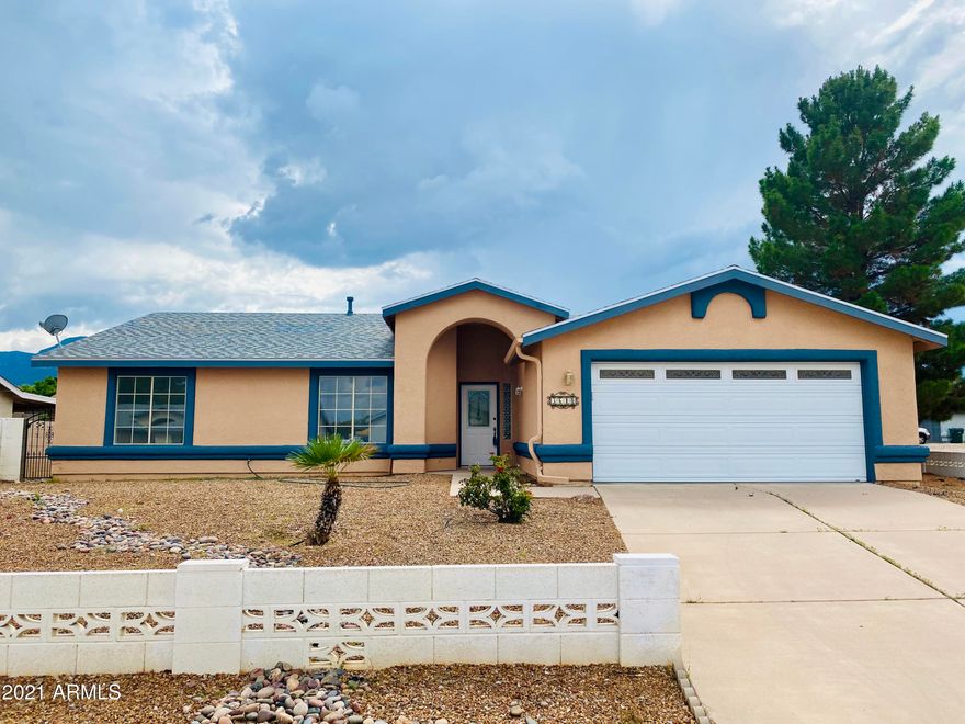 What a home! This Corner cul de sac, 4 bedroom, 2 bath will not last long. In the desirable Mountain Ridge subdivision, with a short distance to Huachuca Mountain Elementary, Ft. Huachuca, and the Country Club. Large living room with gas fireplace. Heated/cooled AZ room. Xeriscape front/backyard. Large kitchen. Master bathroom recently remodeled. New carpet, roof, and paint on inside and outside of home.