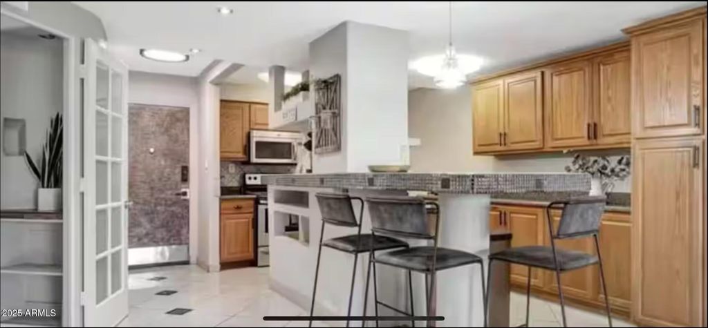 Photo of 7625 E Camelback Road #B101, Scottsdale, AZ 85251 (MLS # 6933322)
