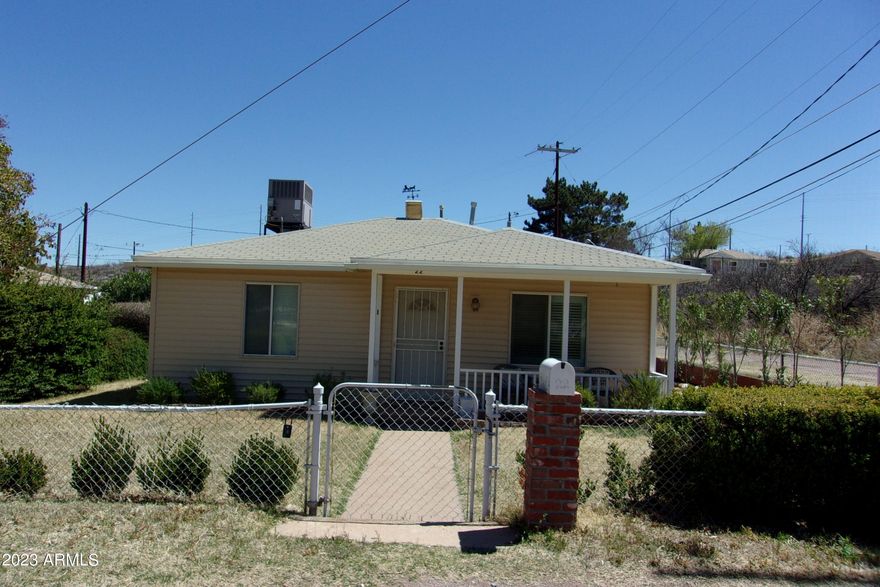 This house is truly something you don't want to miss.  Updated and renovated in the last few years kitchen has granite counter tops and back splash  and newer stainless steal appliances. Ceiling fans in all rooms.  Two bedrooms, two baths and a one car garage new roll of door resently installed. Office could easily be converted to third bedroom just add one door. Also, has  a storage shed.  Very clean inside and out. Great curb appeal.  The 65'' TV remains in the property along with the Island and chairs in the kitchen.  Covered patio.  With some oleanders planted along the fence for future shade. Easy to show 30 min notice.