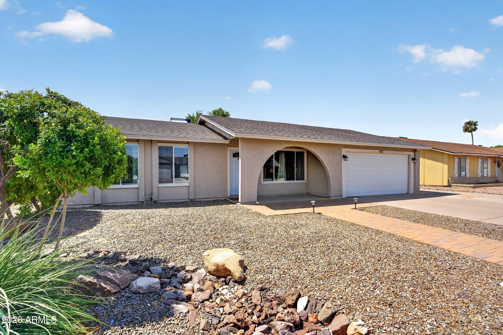 411 W GREENTREE Drive