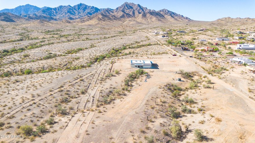 Prime 1-acre parcel offering outstanding views and exceptional privacy. The unobstructed views, create the perfect setting for a custom home with desert scenery and gorgeous views of the Estrella mountains. A recorded, shared well deed is included. Electricity is adjacent to this parcel, and there is no HOA. This is a rare opportunity to secure a premium building parcel with remarkable views, privacy, and essential utilities close by. Walk the property and experience its beauty and the incredible views of the Estrella mountains in person. The property has rights to a shared water well with pump installed and storage tank. There are many possibilities with this land, while still enjoying these incredible views.