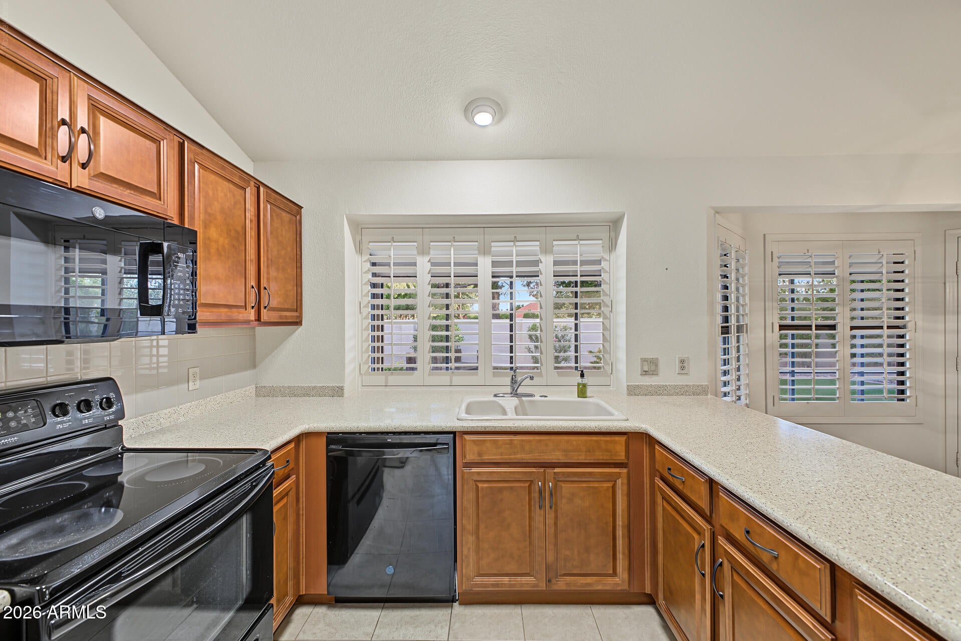 9221 W BEHREND Drive