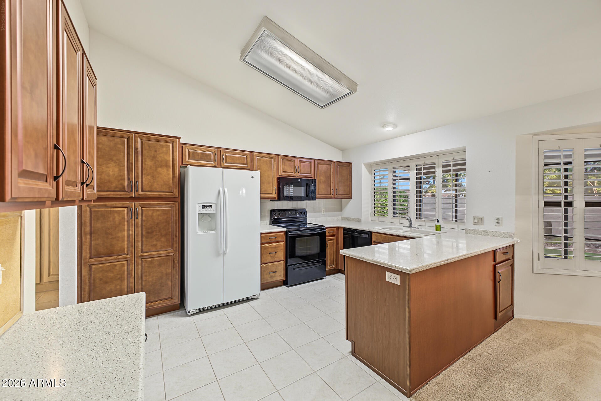 9221 W BEHREND Drive