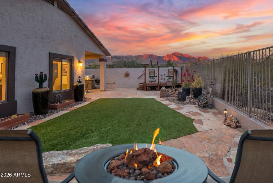 Wow! ***This Fantastic FURNISHED home in SUPERSTITION FOOTHILLS is PRICED TO SELL with a FABULOUS BACK YARD, Great Views & Many Updates! ***Enjoy SUPERSTITION MOUNTAIN VIEWS while relaxing in your NEW HOT TUB overlooking vibrant landscaping with artificial TURF & a PERFECT VIEW DECK for GORGEOUS SUNRISES & SUNSETS! ***You'll appreciate this WELL MAINTAINED HOME offering Tile Flooring t/o,  NEW Exterior Paint (2025), NEW ROOF (2024), NEW HVAC (2016), NEW Hot Water Heater (2018), NEW PVC DRIP SYS (2018), NEW Water Softener (2022), NEW Reverse Osmosis (2021) with line to ice maker + NEW: Refrigerator, Disposal, Landscape Update with New Rock & More!  Convenient Pull-Out Kitchen Shelves & Cool Custom Built-in Entertainment Buffet/Bar/Cabinets too +++ Must See! ***Superstition Foothills is .. ....most sought after subdivisions in Gold Canyon with LOW HOA FEES and RARE AMENITIES including... HEATED COMMUNITY POOL & SPA, Pet-Friendly Park & 52 Fantastic Hiking & Walking Trails ***Additionally, Superstition Foothills is a FIREWISE community! It is one of only 2 Gold Canyon Communities in the national Firewise USA® recognition program! **Walk to Shopping, Dining, Coffee Shops & hiking trails. CHECK IT OUT TODAY! ***Conveniently Located, close to WORLD CLASS HIKING and Gold Canyon Golf Resort, which offers two 18-hole Championship golf courses (Dinosaur Mountain and Sidewinder) and Expansive PATIO DINING with amazing golf and mountain views! ***Nature lovers will ENJOY the nearby 2.9 million acres of Tonto National Forest wilderness, hiking, off-road trails plus four beautiful, pristine lakes too! Conveniently located just 35 minutes from Sky Harbor Airport and 20 minutes from Mesa Gateway Airport and San Tan Village Shopping & Dining! ***You'll LOVE the GOLD CANYON LIFESTYLE!