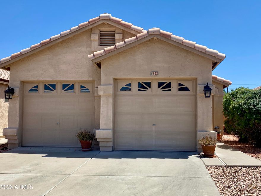 Welcome home to this inviting 3-bedroom, 2-bath charmer with a desirable split floor plan and vaulted ceilings that make the home feel open and bright. Attractive 18'' tile runs throughout, offering a clean, low-maintenance look. The spacious eat-in kitchen features tile countertops and backsplash, stainless steel appliances, and plenty of room to gather. All appliances stay--including washer and dryer--and you'll enjoy the convenience of an inside laundry room and 2-car garage. Outside, relax in your private, low-maintenance backyard with mature landscaping and a covered patio. Enjoy peace of mind with a newer hot water heater and A/C, plus a new $4k split air handler. All this just minutes from the 101 and I-17.