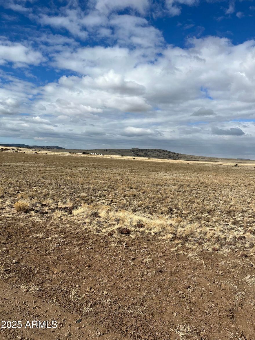 5 separate lots included in this listing totaling 1.77 acres. These off-grid lots have a 360 view of our beautiful mountains! Tucked in a sloping terrain you will see a vast array of stars and beautiful sunsets w/ lots of dirt roads to explore!