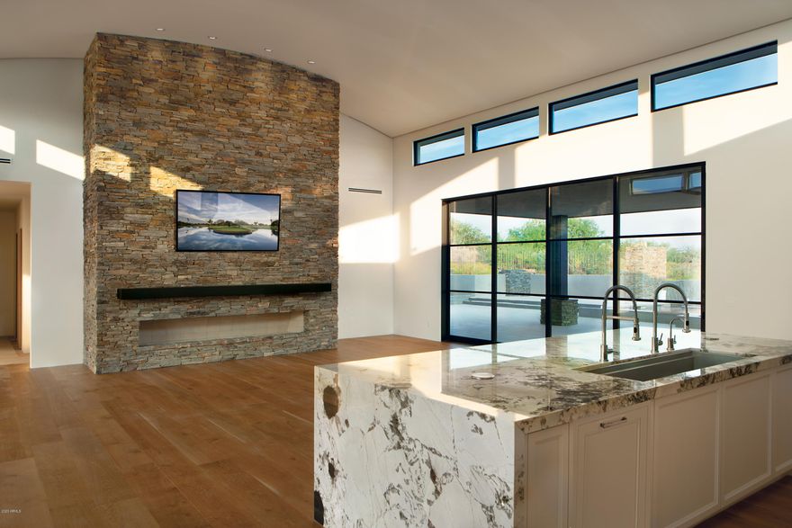 COMPLETION SEPTEMBER 2020.....Another beautiful new build by Salero Homes. Warm contemporary with glass curtain walls that account for magnificent views of the Apache Course, down valley lights, and the Continental Mountains with a thoughtful arrangement that offers privacy and light. Four full ensuites and an open great room featuring a spacious and well-appointed kitchen and private dining room. Views from every room define this transitional home nestled between fairways.  Membership is not included but available through the Desert Mountain Club.