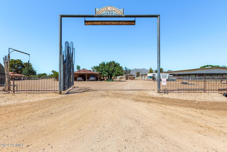 Here's your chance to one a piece of Waddell history...the iconic LITTLE KENTUCKY!  Equestrians, trainers, breeders, this is the property you have been looking for. Offering an impressive 140 x 250 covered arena, 3 enclosed barns offering 16x16 stalls fully trimmed out with high pressure mister systems, water and electric, the large barn also offers a workshop shop and trainers office with kitchenette area, there is an additional 4 stall shed row offering 12x 32 stalls, 60' trainers round pen, hot walker, covered hay storage, several tack and storage areas, wash rack,. multiple pastures, exercise track, 32 stalls in total and not to mention the very comfortable and nicely appointed 3 bedroom apartment AND ASK US ABOUT THE POSSIBILITY OF PURCHASING THE MAIN HOME AND ADDTIONAL 4 ACRES!!!
