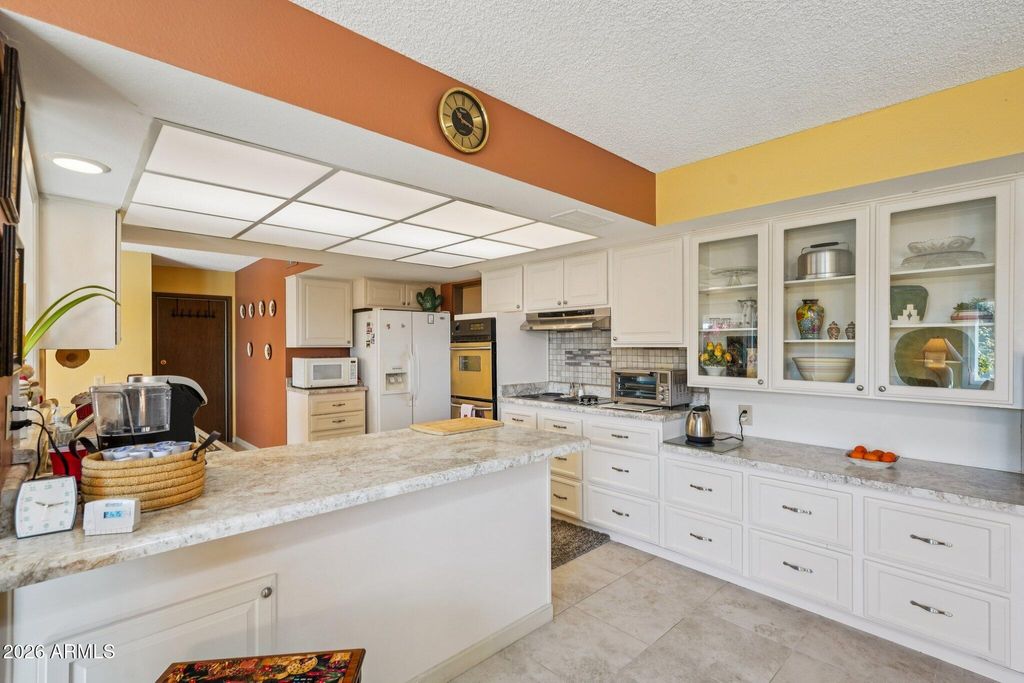 Photo of 9843 W Wrangler Drive, Sun City, AZ 85373 (MLS # 6992257)