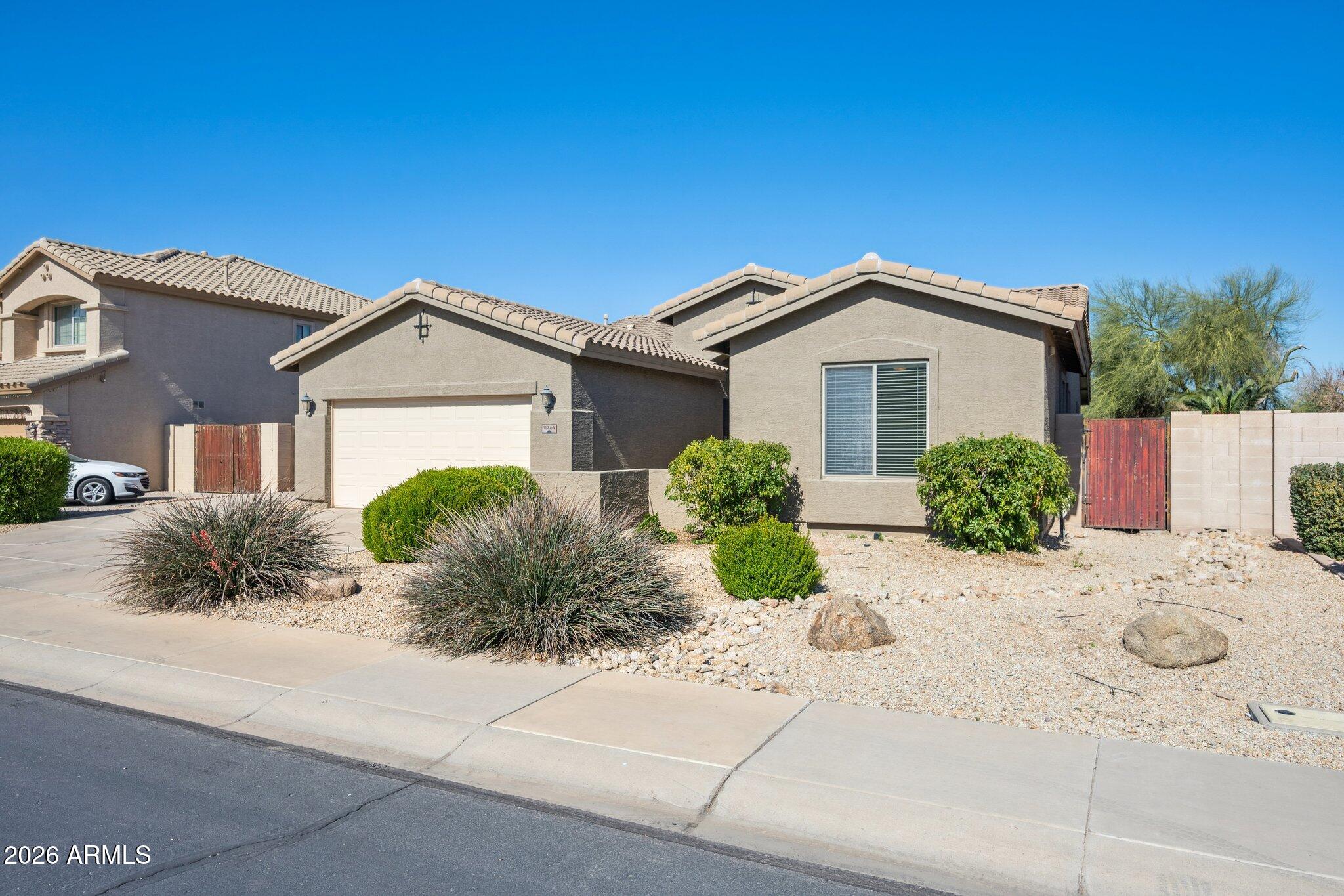 11264 E SHERIDAN Avenue