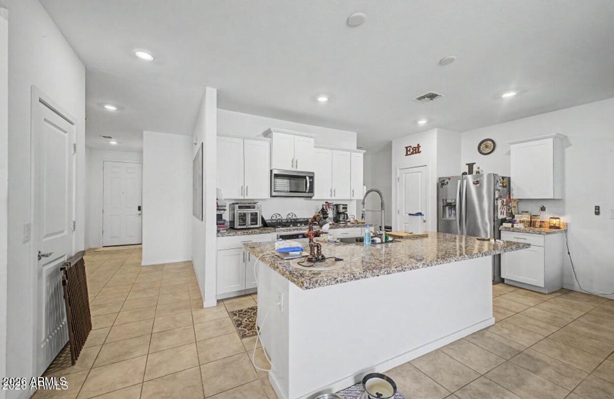 12418 W GLENN Court