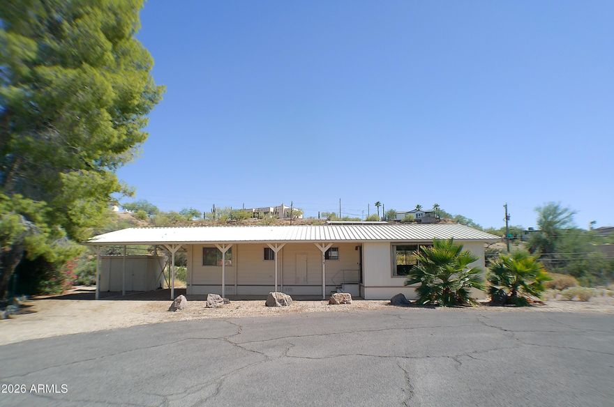 Charming, Well-Maintained Home on a Quiet Cul-de-Sac Near Queen Valley Golf Course!

This cozy and fully furnished 1-bedroom, 1-bath home offers comfort, convenience, and classic Arizona living. Located just minutes from the Queen Valley Golf Course, it features a 32x8 screened-in Arizona room perfect for relaxing and enjoying the evenings.

A covered carport provides shaded parking, and the large storage shed includes an outdoor laundry area for added functionality. The property has been well cared for and is move-in ready.