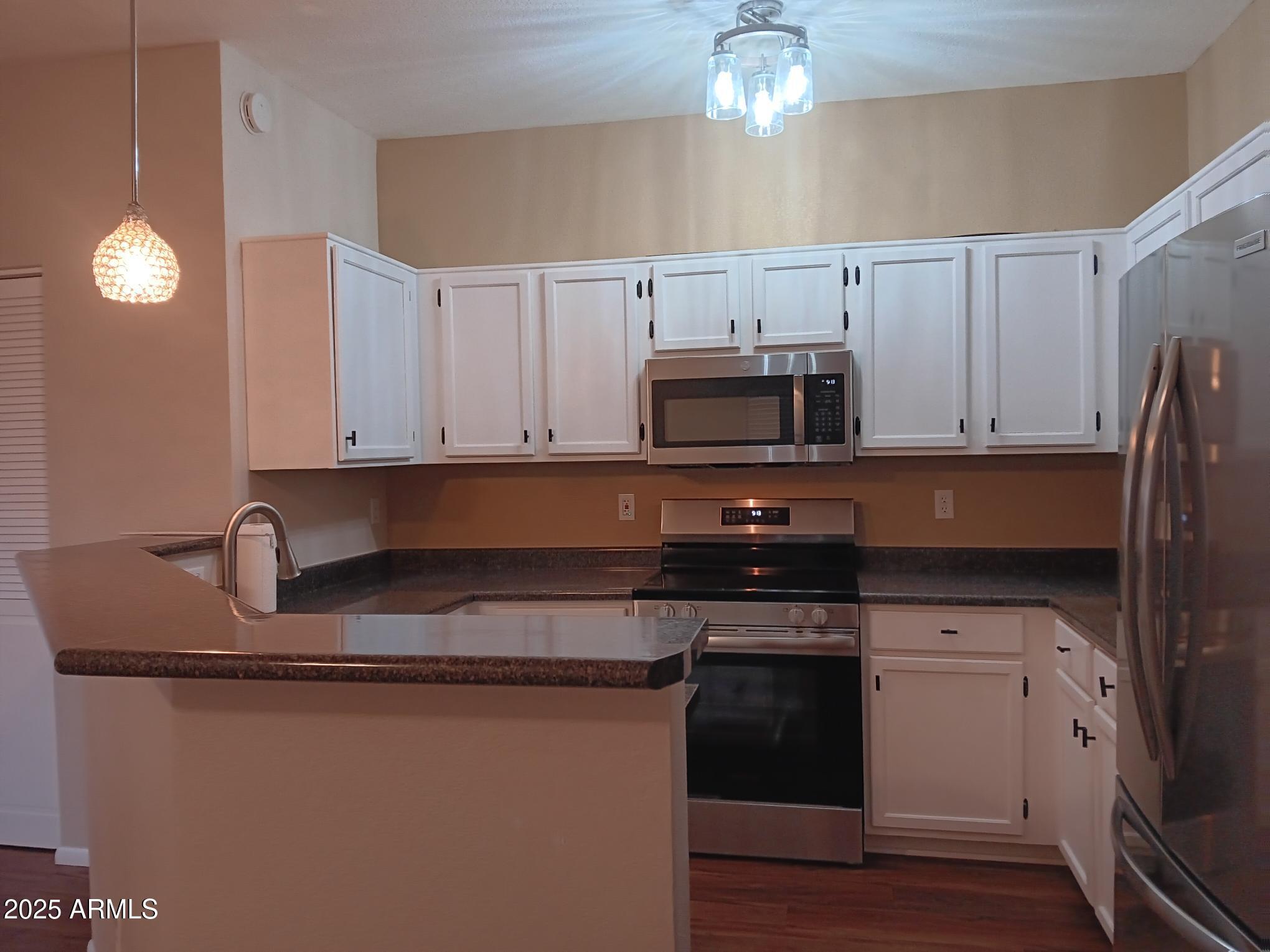 6827 W AIRE LIBRE Avenue