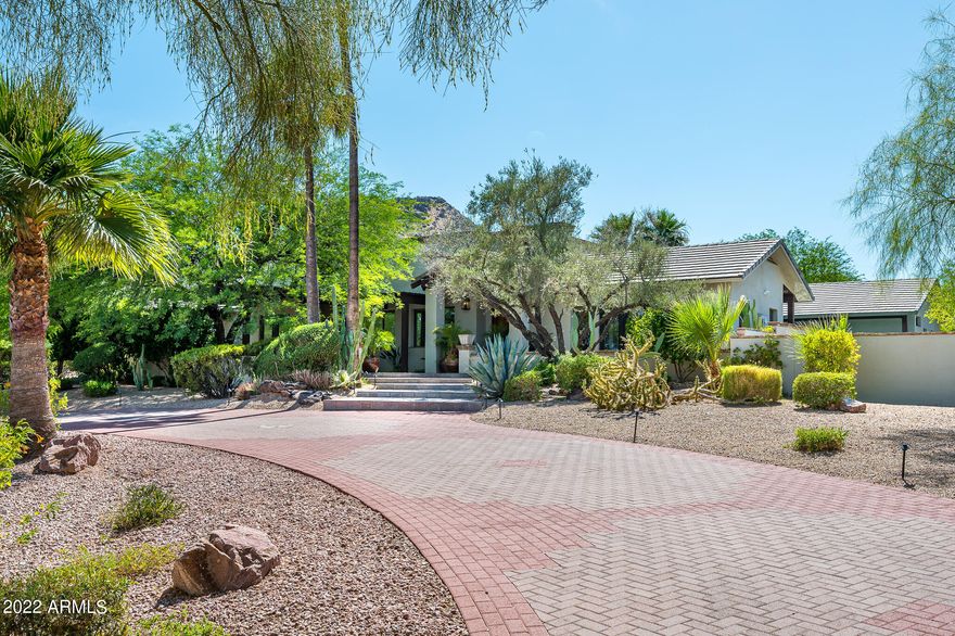 Great house, Great location, Great Price! This recently remodeled single level home in Paradise Valley has an exceptional indoor outdoor feel on a generously sized lot. During the remodel, all ceiling heights were raised to a minimum of 10', but most are much higher. The home consists of all new hardwood floors and new sewer connection. It features an oversized office and game room, with a room off of the pool that can be converted into an attached guest house, if desired. This property is very versatile and has unmatched potential. This house won't last long at this price!