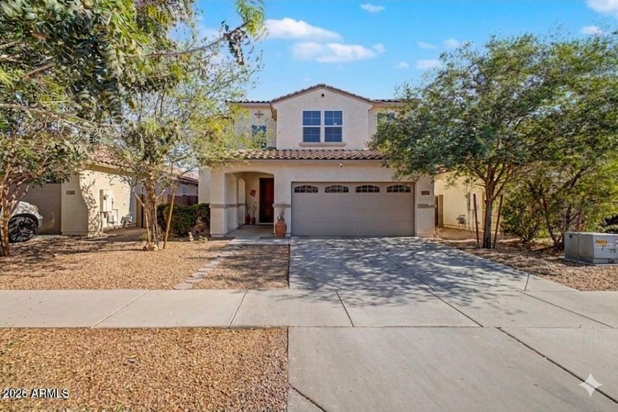 Welcome to your next chapter!  This stunning two-story residence in the heart of Tolleson offers the perfect blend of modern scale and suburban comfort.  Come see this thoughtfully designed house, as it's a standout!  Looking for a downstairs suite?  Say no more, it offers a spacious junior primary bedroom suite downstairs with an amazing backyard that checks all the boxes.  Need a big loft?  Check!  Need a killer primary closet?   Check!