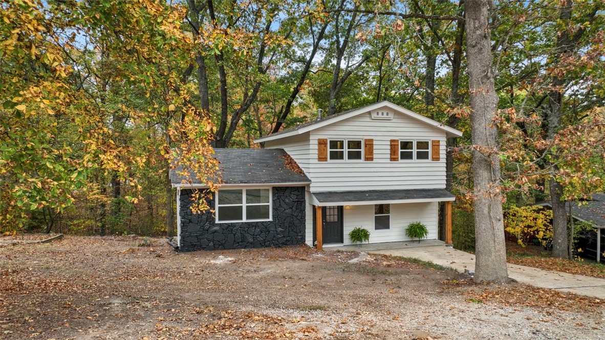 So much to fall in love with at a jaw-dropping price! Nestled beside stunning trails, a fabulous country club, and peaceful lakes, youāll find yourself enjoying the perfect blend of convenience and tranquility. This place has had a makeover and is bursting with goodies, featuring fully updated three bedrooms and two bathrooms upstairs, plus a spacious living room, half bath, kitchen, and a versatile bonus room downstairs. You'll swoon over every updated bathroom, the new quartz countertops, the new double pane windows, and the sleek new luxury vinyl plank flooring! On top of all that spaciousness inside, there's a stunning covered back deck that serves as your own private forest get away. If you work at Walmart, crave the peacefulness of the woods, or just love all the Bella Vista perks, youāve got to check this out! Book your tour and see if this beauty is calling your name! Despite boasting 3 bedrooms and a bonus room, this homeās septic system is only ready to party like itās a cozy 2-bedroom!