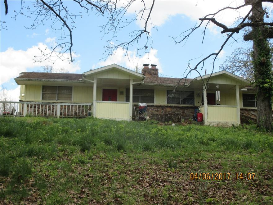 Property being sold "as is". 2 bedroom 2 bath duplex close to Beaver Lake. Each side has gas log fireplace in living room open to kitchen. Master bedroom has Jacuzzi tub and separate shower. With TLC this would be a great investment property.