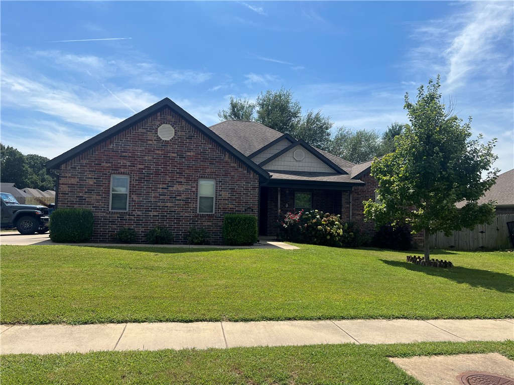 Beautiful corner lot home, in town close to Bentonville & Rogers for all of your shopping and dining amenities. This home has 4 Bedrooms, 2 Bathrooms and a half bath. Big 3 car garage, privacy fence, Over sized Out Building/ workshop in back yard. Kitchen has large island and pantry, tray ceilings, walk in closets open concept split floor plan home. Come see this beautiful home for all of your family needs.