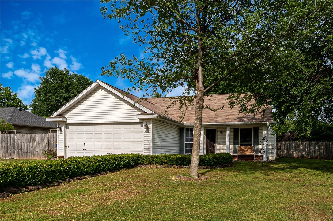 Awesome 4-bedroom starter home located on beautiful corner lot in Lowell Estates! 2-car garage has been converted to large fourth bedroom. Huge yard complete with storage, deck and serene pergola with hanging garden. Centrally located and close to restaurants, schools, park and amenities. Don't miss it!