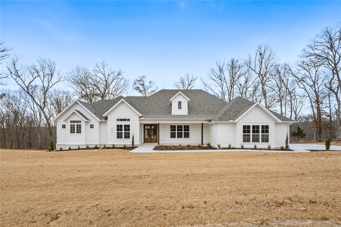 Custom built home on 1.25 acres in a quiet neighborhood just minutes from everything, yet feels like far in the country. Rolling hills and mature trees abound this home featuring an open floor plan, tall ceilings, custom trim, a massive outdoor living space and so much more.