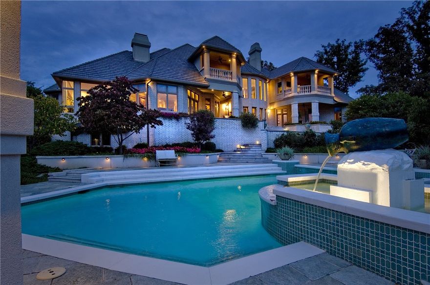 Large 1.71 acre estate lot in the Pinnacle Country Club. Views of the 8th green from every room of this sophisticated residence.  Stunning entry detailed with grand staircase & custom chandelier. Gourmet kitchen opens to family room & solarium.  Luxurious Master suite in main level w/private in-ground spa. Additional rooms include grand 2 level Study/Library, Media room, Exercise room & 3 large guest suites. Outdoor oasis perfect for entertaining complete with pool and cabana.