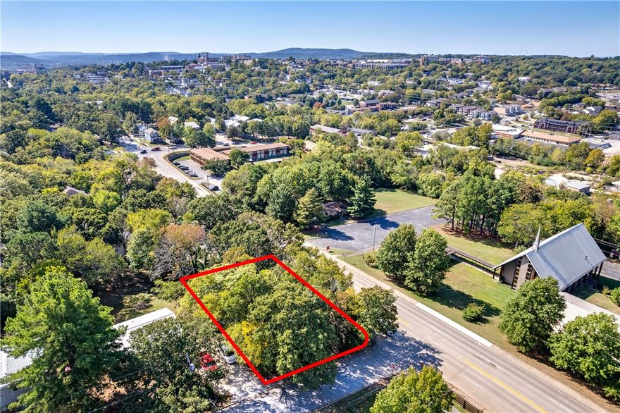 Fantastic opportunity to own a vacant lot in a sought-after Fayetteville neighborhood. This property sits in a convenient area surrounded by mature trees and established homes, creating a peaceful yet accessible atmosphere. Just about 1 mile from Wilson Park and less than 2 miles from the University of Arkansas, it offers the perfect blend of city comfort and natural charm. Whether you plan to build your forever home or develop a rental investment, this lot provides outstanding potential. All city utilities are available, making the building process straightforward. Enjoy proximity to restaurants, shopping, and outdoor recreation while living in a tranquil setting. A smart investment in one of Fayetteville’s thriving areas.