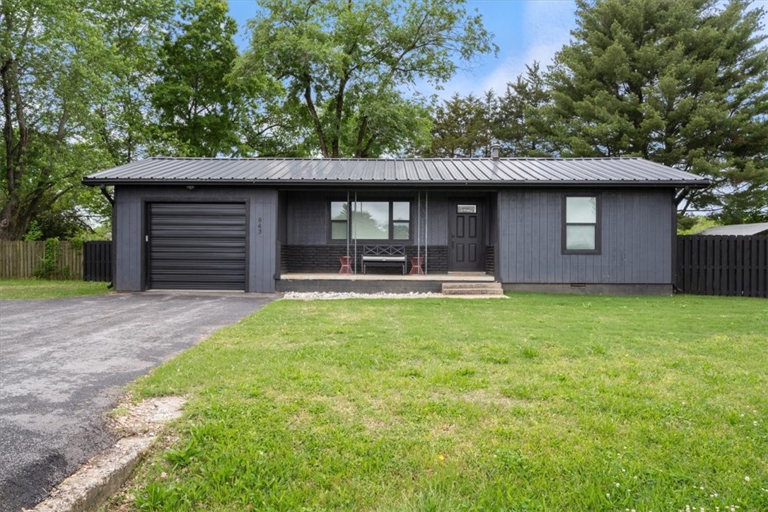 This is a cute little home for a first-time home buyer, someone looking to downsize or an investor. Lots of new in this one! New roof, LVP flooring, windows, paint, garage door, exterior doors and appliances! Huge laundry room with extra storage. A large fenced in backyard with a nice concrete patio. This house has been used as an Airbnb until present, Airbnb income statement available upon request. All contents of home are negotiable. Refrigerator and the shed in backyard to convey.